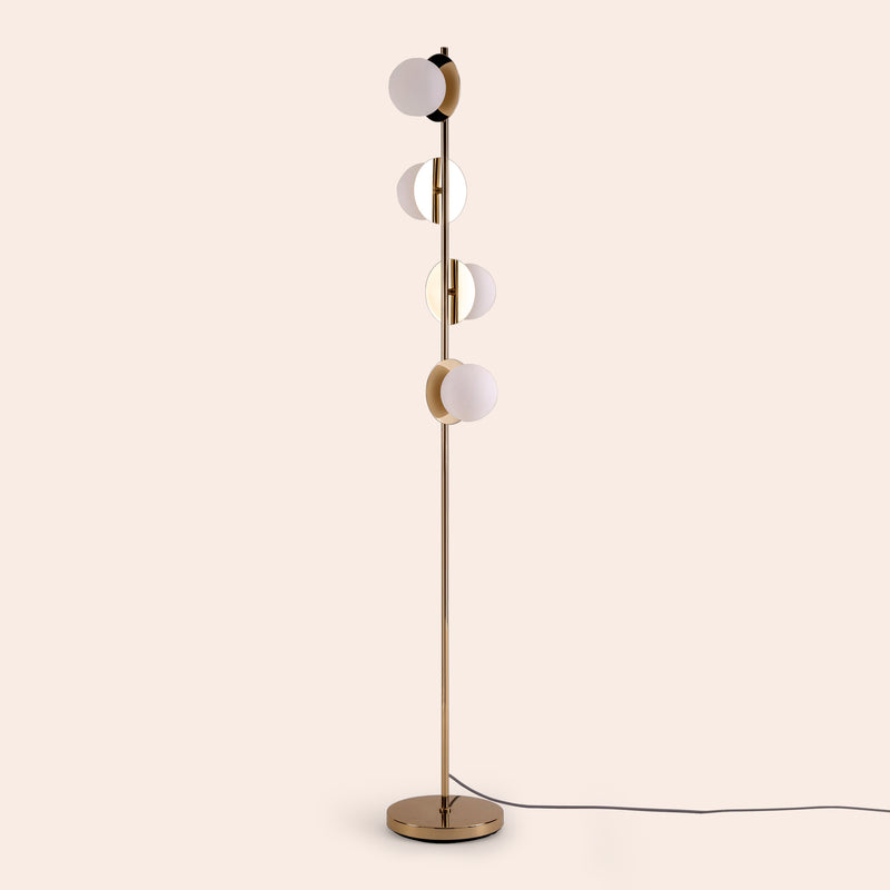 Brass opal disk floor lamp