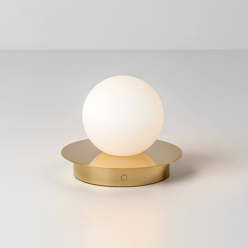 Brass opal disk cordless table lamp