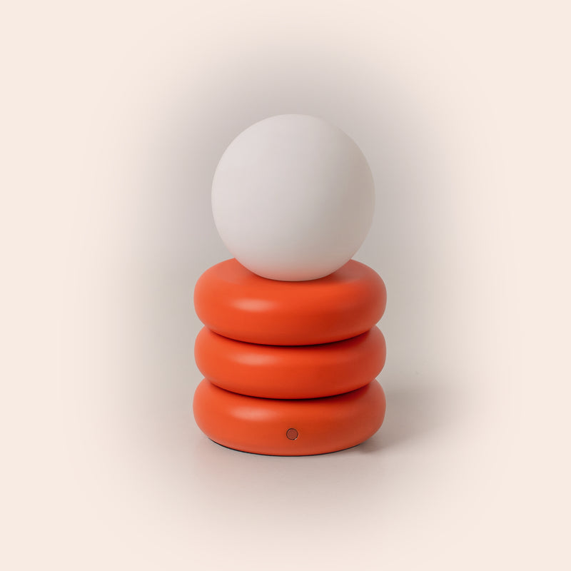 Peel orange tube cordless table lamp