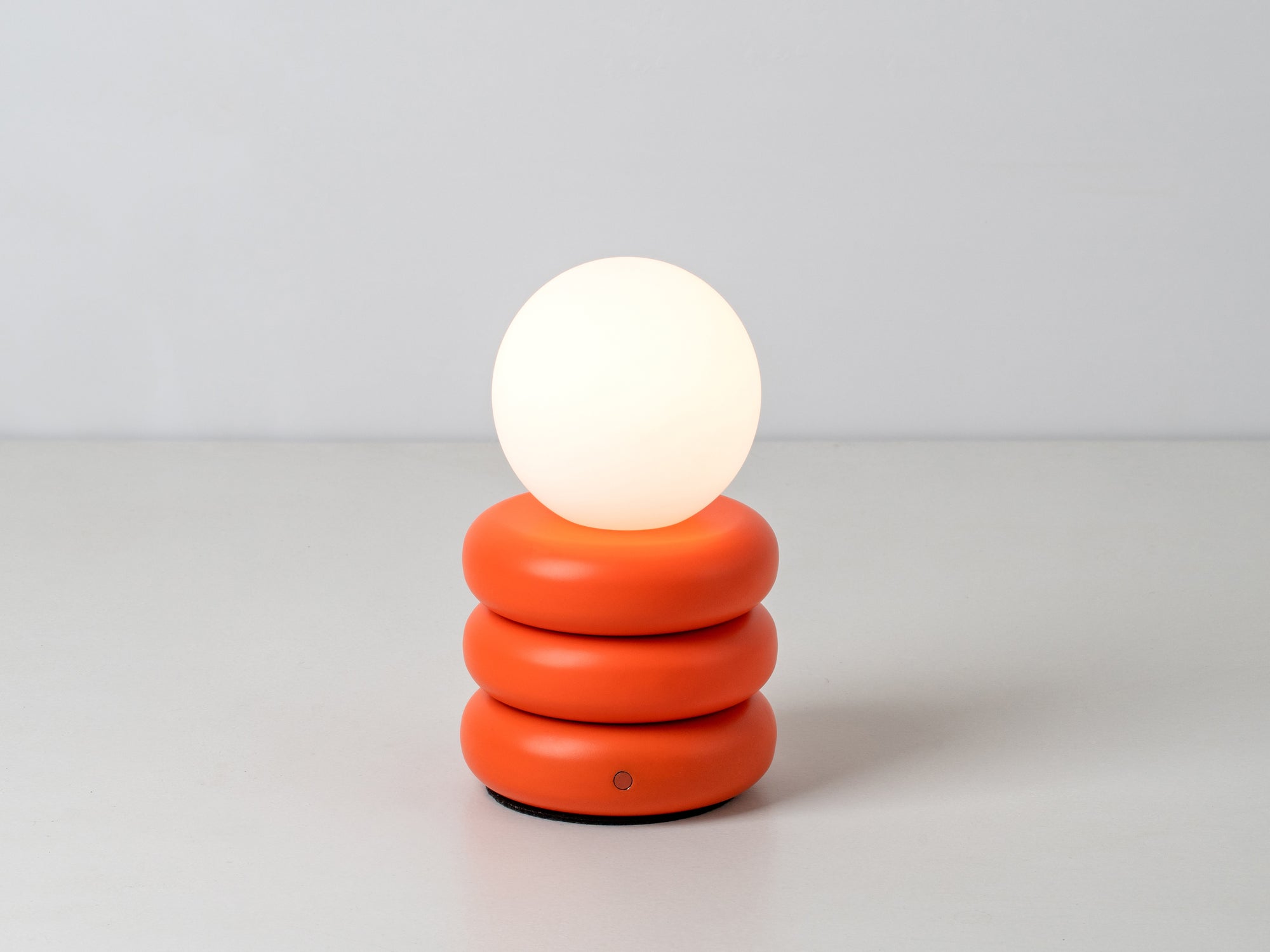 Peel orange tube cordless table lamp