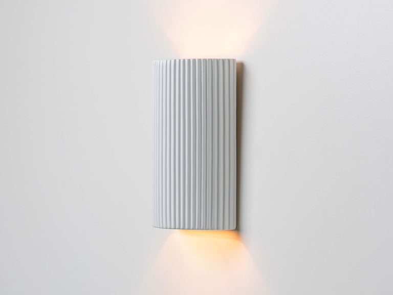 White ribbed ceramic pillar