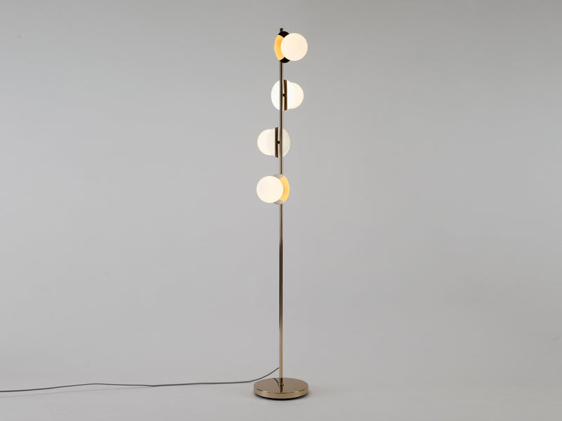 Brass opal disk floor lamp