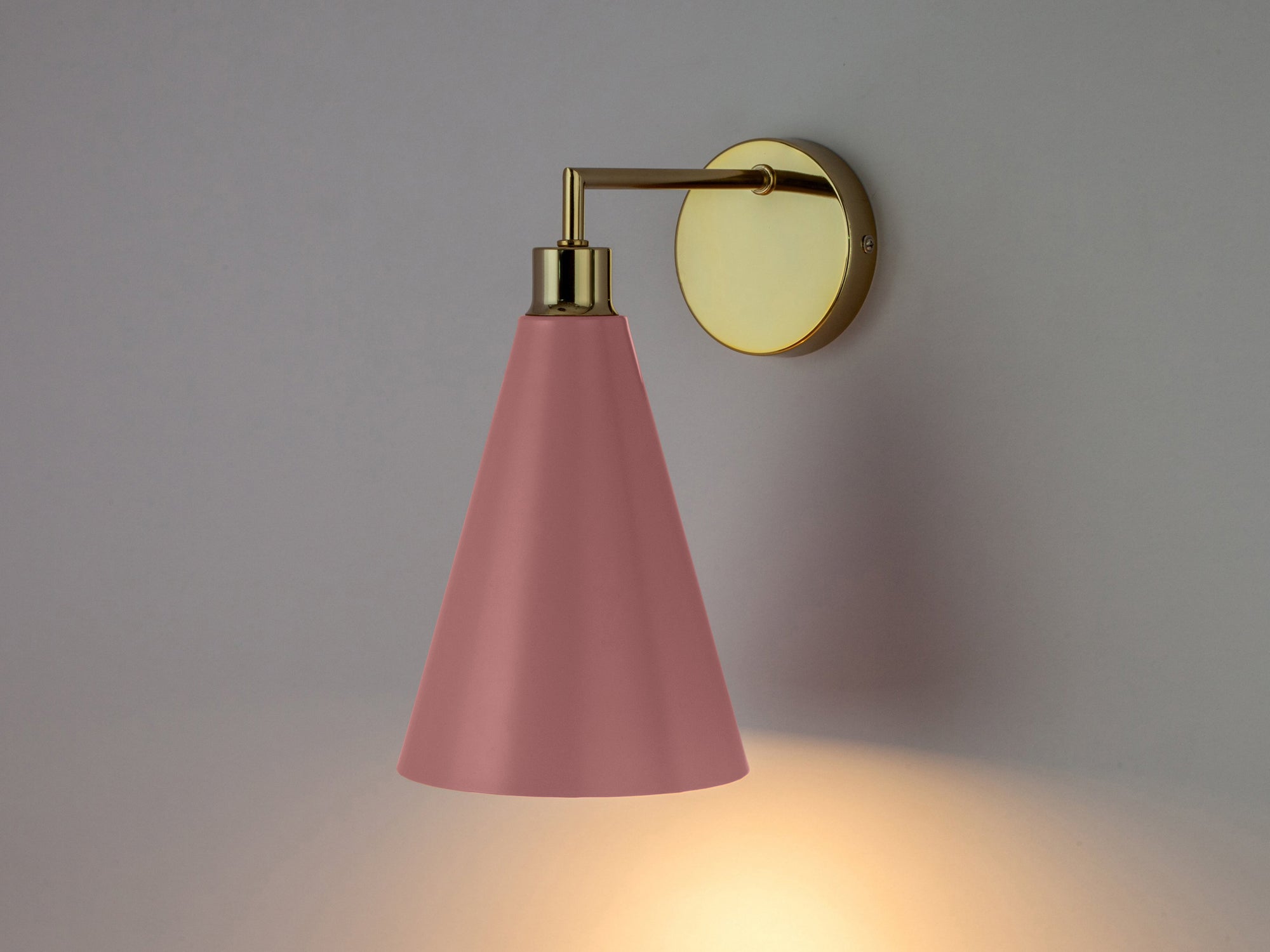 Pink cone shade wall light